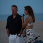 Massimo Caronna & Cristina Cuomo gives a speech at the Purist & Cucinelli Cookout at Atlantic Beach